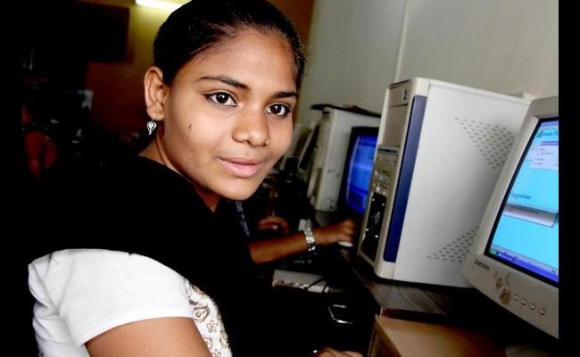 Reshma, a 16-year-old student learning MS Office at a computer class in Ahmedabad, Gujarat supported by ActionAid Association. Photo credit: Chintan Gohil - Sakshi Post