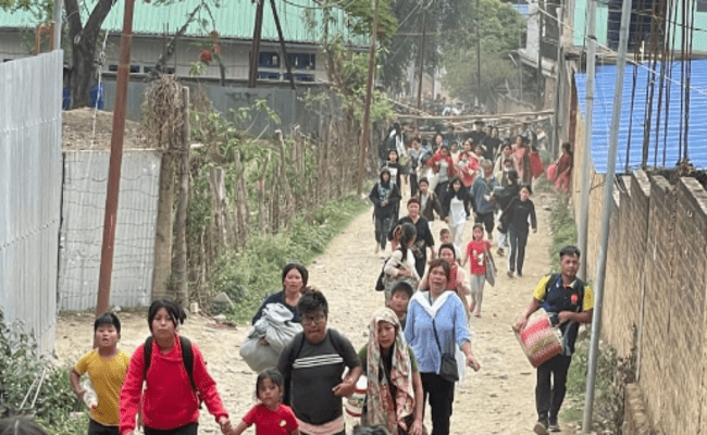 People fleeing their homes in violence-hit Manipur (Source: Twitter)  - Sakshi Post